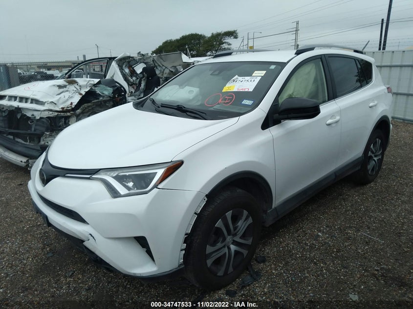 VIN JTMZFREV4JJ212278 2018 TOYOTA RAV4 LE