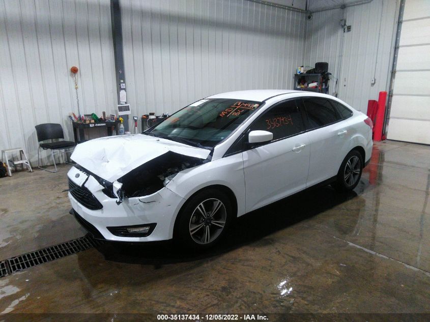 VIN 1FADP3F20JL204830 2018 FORD FOCUS SE