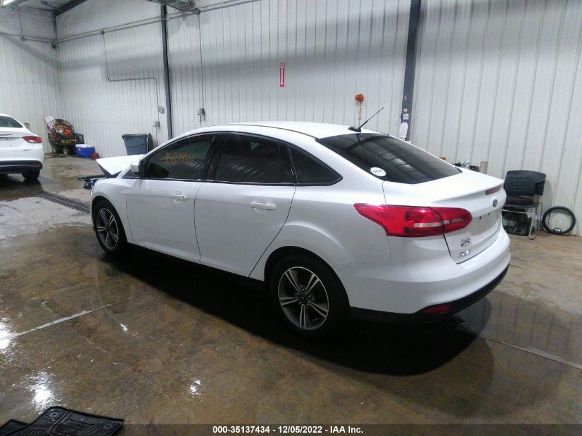 VIN 1FADP3F20JL204830 2018 FORD FOCUS SE