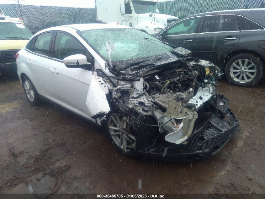 VIN 1FADP3F21HL291129 2017 FORD FOCUS no.1