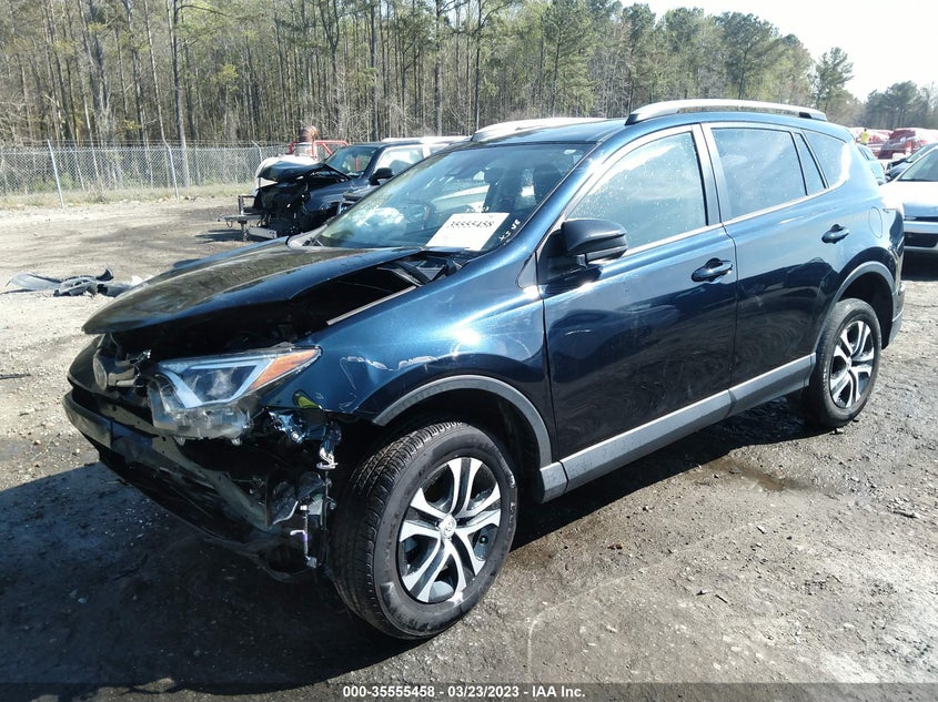 VIN JTMZFREV1JJ751621 2018 TOYOTA RAV4 LE