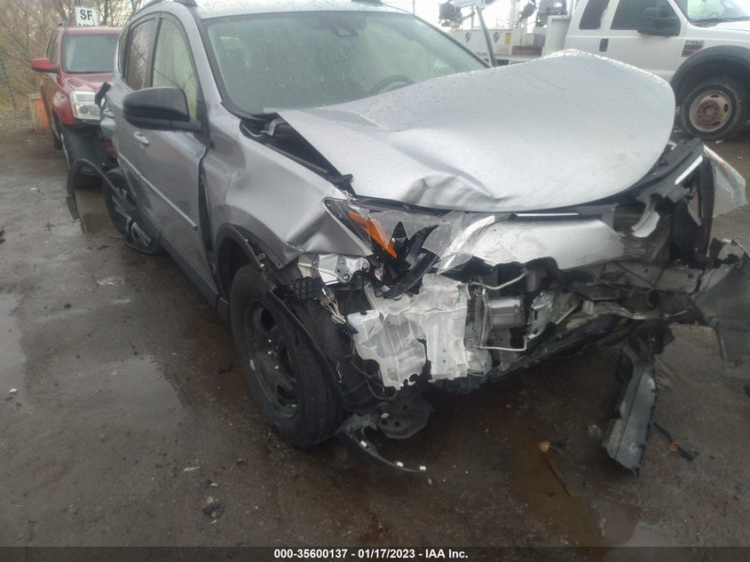 VIN JTMBFREV4JJ201282 2018 TOYOTA RAV4 LE