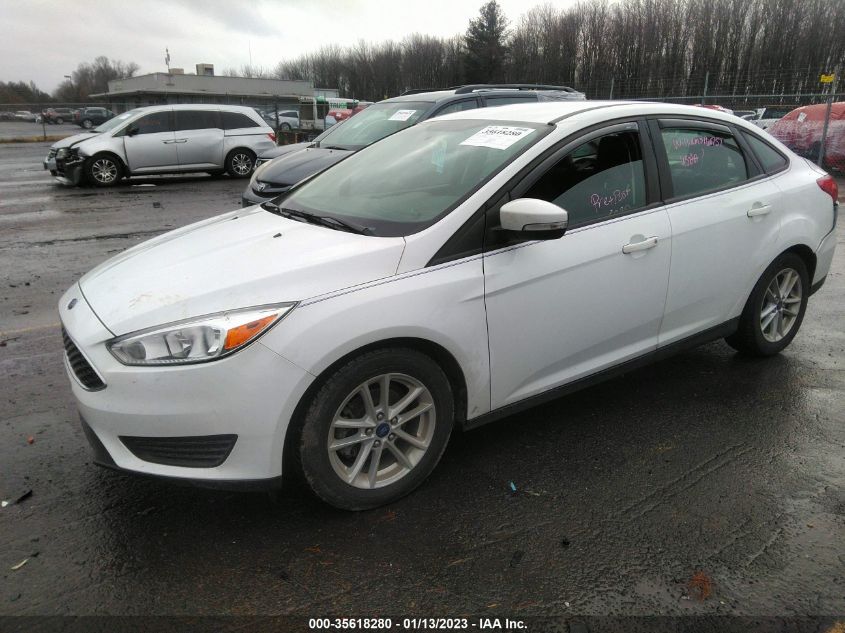 VIN 1FADP3F20JL213799 2018 FORD FOCUS SE