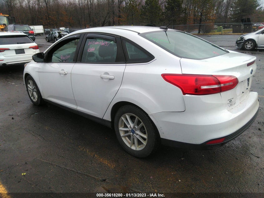 VIN 1FADP3F20JL213799 2018 FORD FOCUS SE