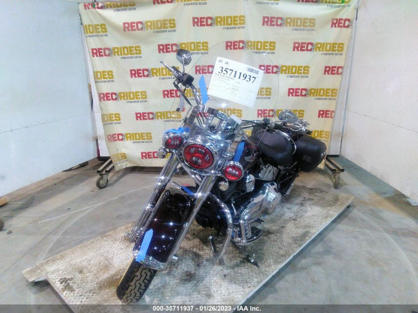 2011 HARLEY-DAVIDSON FLSTN 1HD1JD515BB012824