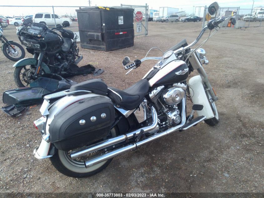 2011 HARLEY-DAVIDSON FLSTN 1HD1JD519BB040688