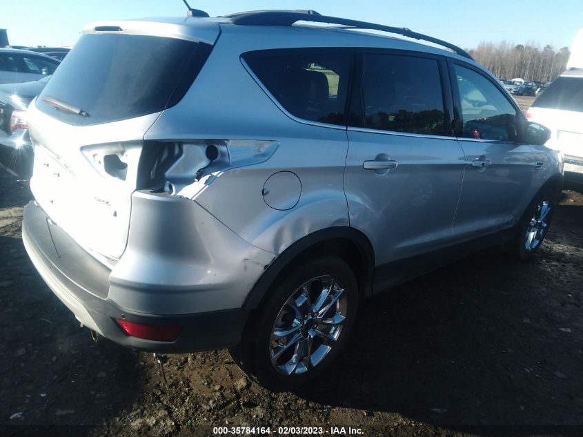 VIN 1FMCU0HX9DUA00527 2013 FORD ESCAPE no.4