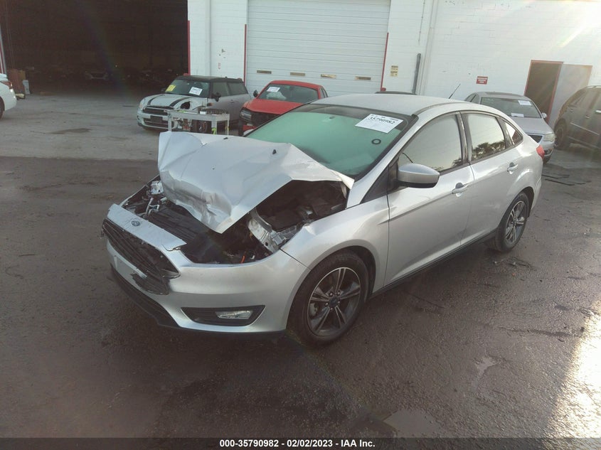 VIN 1FADP3F2XJL299817 2018 FORD FOCUS SE