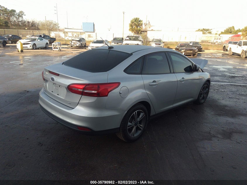 VIN 1FADP3F2XJL299817 2018 FORD FOCUS SE