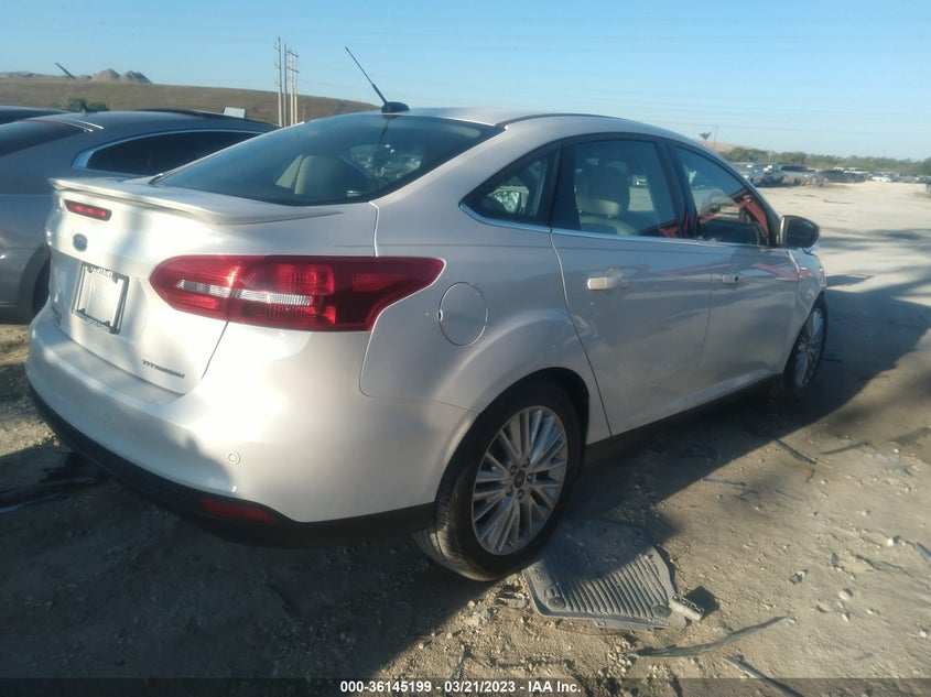 VIN 1FADP3J29JL214909 2018 FORD FOCUS TITANIUM