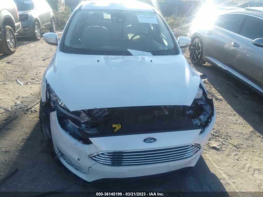 VIN 1FADP3J29JL214909 2018 FORD FOCUS TITANIUM