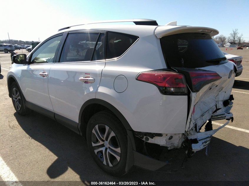 VIN JTMBFREV2JJ749295 2018 TOYOTA RAV4 LE
