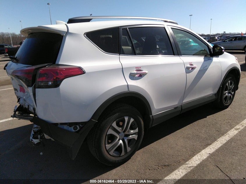 VIN JTMBFREV2JJ749295 2018 TOYOTA RAV4 LE