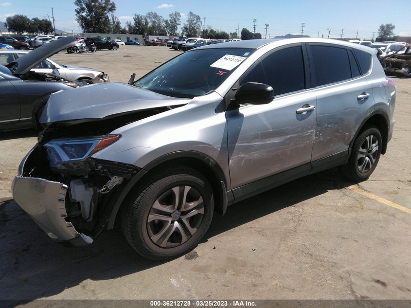 VIN JTMZFREV3JJ172940 2018 TOYOTA RAV4 LE