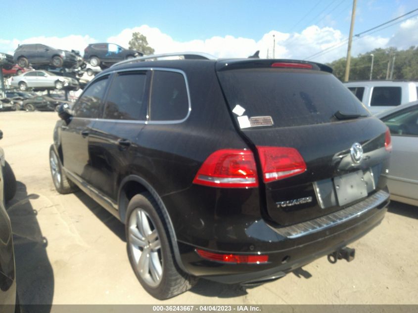 2014 VOLKSWAGEN TOUAREG EXEC WVGEF9BP3ED012173