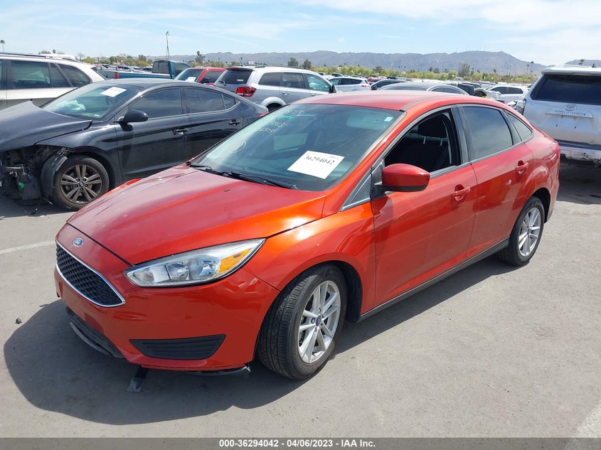 VIN 1FADP3FE1JL293463 2018 FORD FOCUS SE