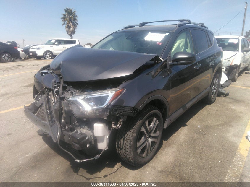 VIN JTMZFREV3JJ739714 2018 TOYOTA RAV4 LE