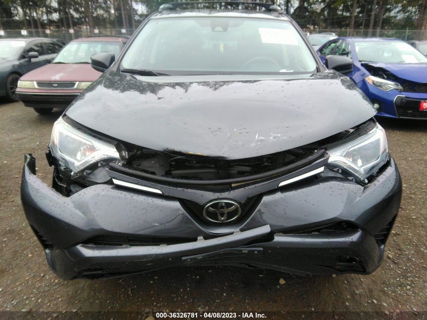 VIN JTMBFREV2JJ204133 2018 TOYOTA RAV4 LE