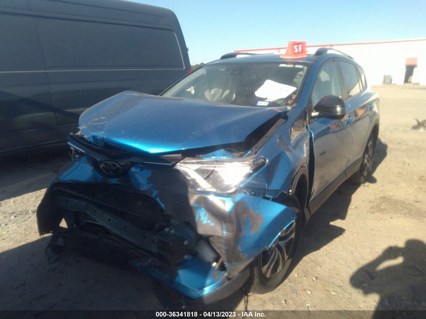VIN JTMZFREV0JJ725866 2018 TOYOTA RAV4 LE