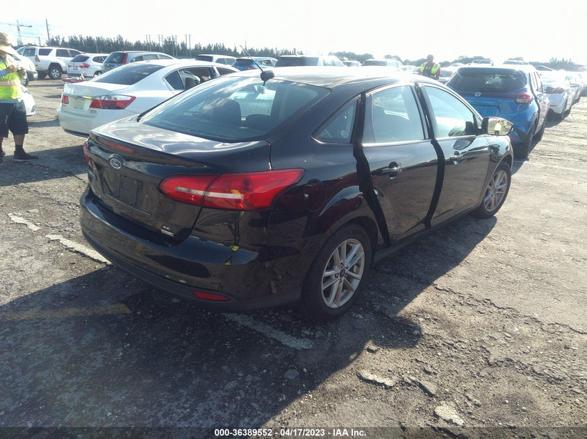 VIN 1FADP3FE6HL321509 2017 FORD FOCUS SE