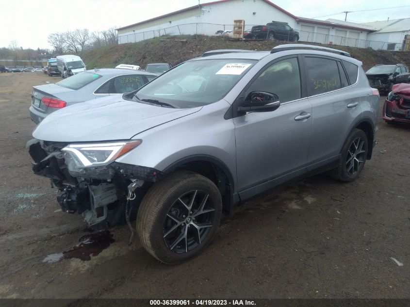 2018 TOYOTA RAV4 SE - JTMJFREV6JD232396