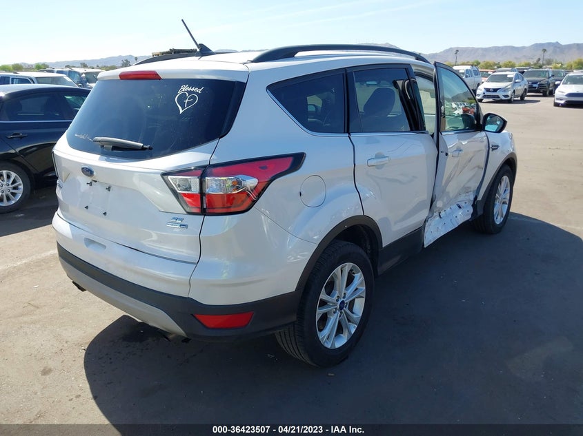 VIN 1FMCU9GD7JUD15690 2018 FORD ESCAPE SE