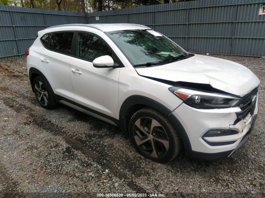 2017 HYUNDAI TUCSON LIMITED/SPORT AND ECO/SE - KM8J33A23HU37178