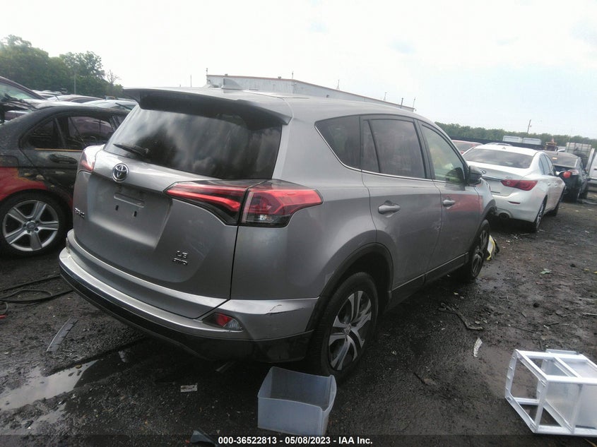 VIN JTMBFREV1JJ204768 2018 TOYOTA RAV4 LE