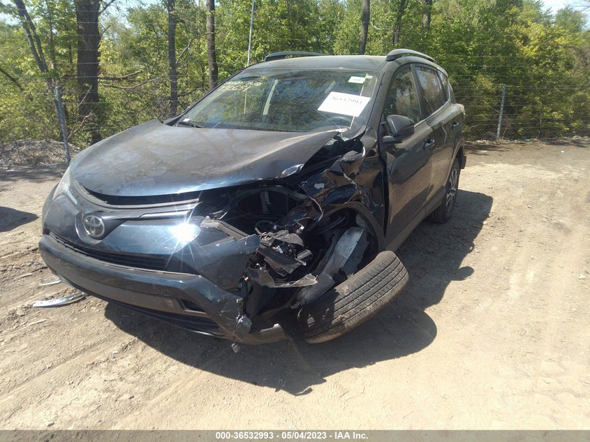 VIN JTMZFREV4JJ730651 2018 TOYOTA RAV4 LE