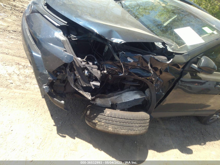 VIN JTMZFREV4JJ730651 2018 TOYOTA RAV4 LE