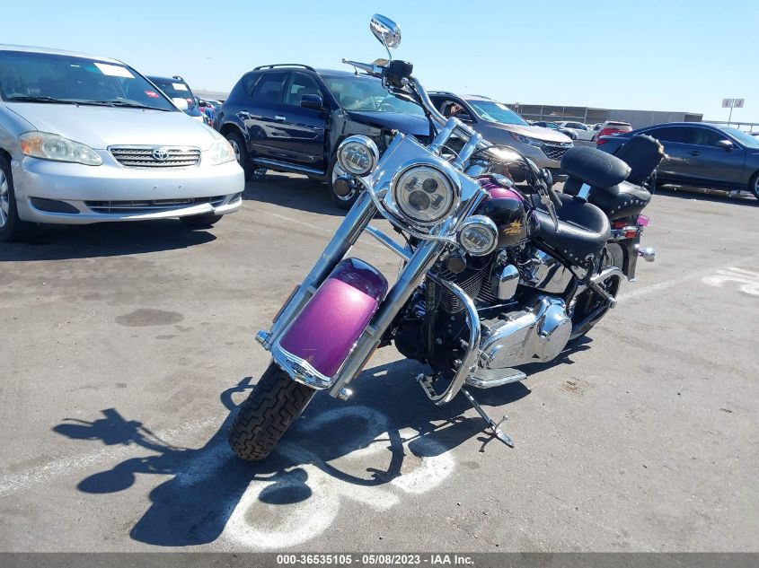 2011 HARLEY-DAVIDSON FLSTN 1HD1JD512BB024008