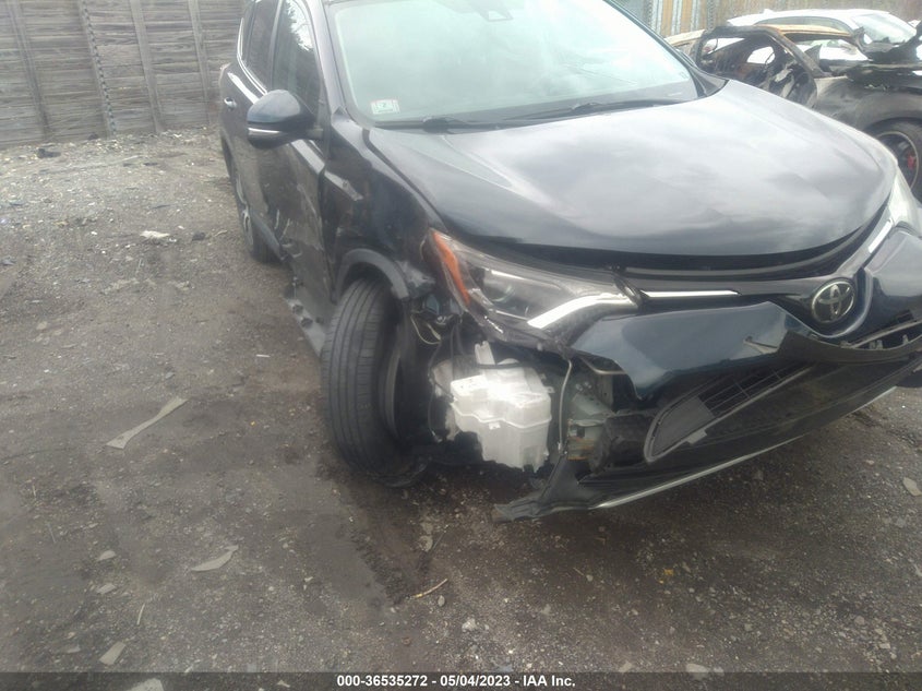 VIN 2T3RFREV6JW770909 2018 TOYOTA RAV4 XLE/ADVENTURE
