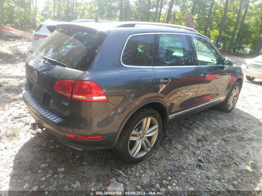 2013 VOLKSWAGEN TOUAREG EXEC WVGEP9BP9DD013582