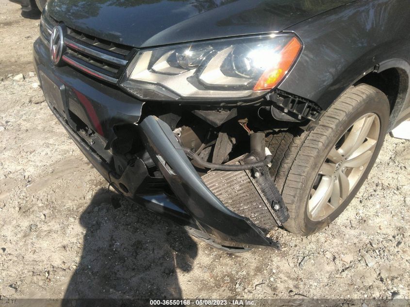 2013 VOLKSWAGEN TOUAREG EXEC WVGEP9BP9DD013582