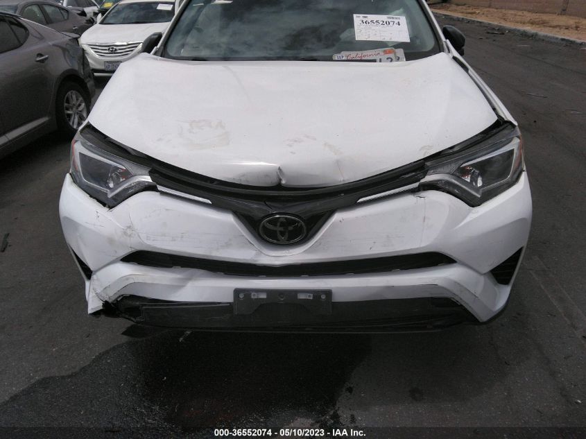 2018 TOYOTA RAV4 LE - JTMZFREV1JD129387