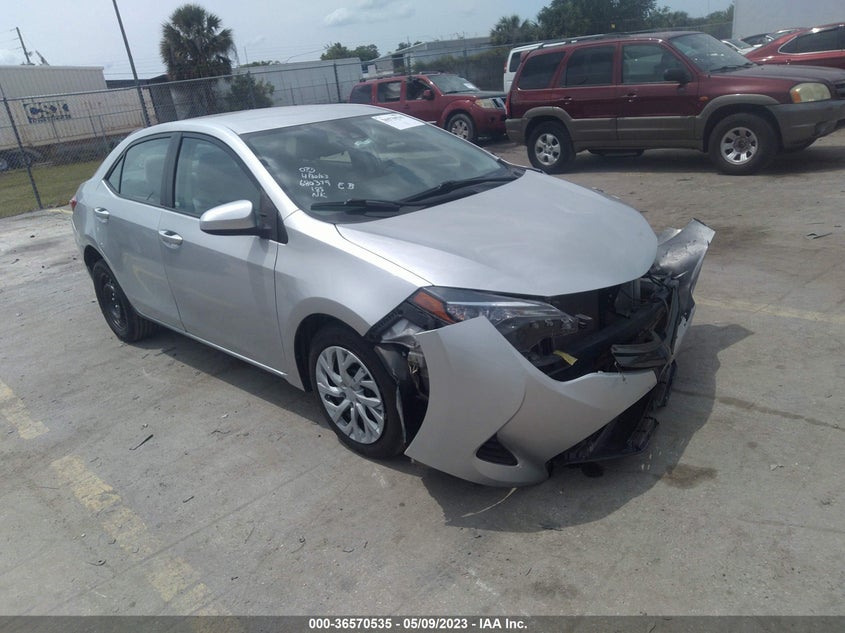VIN 5YFBURHE1HP683099 2017 TOYOTA COROLLA LE