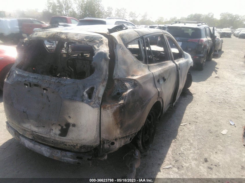 VIN JTMZFREV4JJ207307 2018 TOYOTA RAV4 LE