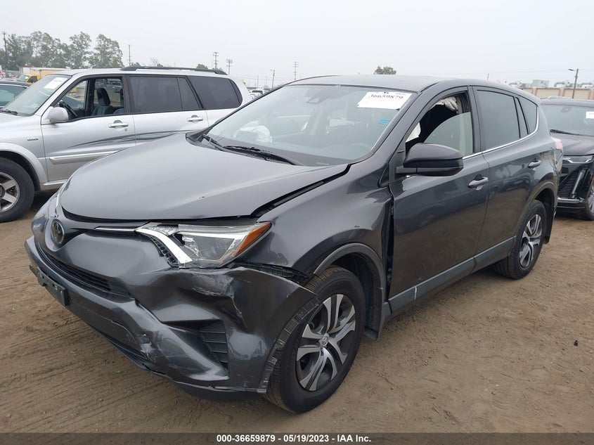 VIN JTMZFREV6JJ189232 2018 TOYOTA RAV4 LE