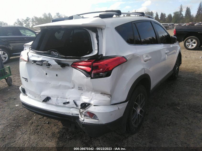 2018 TOYOTA RAV4 LE - JTMBFREV2JJ257396