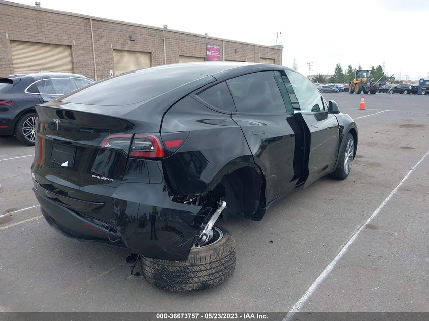 VIN 7SAYGDEE4PF773997 2023 TESLA MODEL Y LONG RANGE