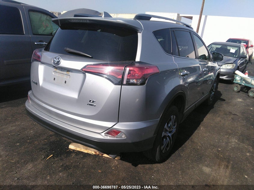 VIN JTMBFREV6JJ203180 2018 TOYOTA RAV4 LE