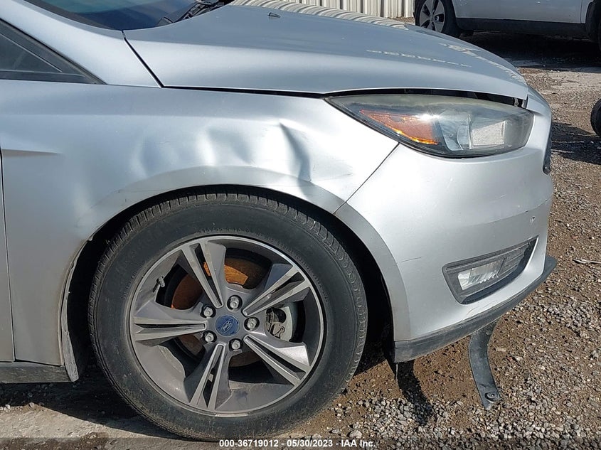 VIN 1FADP3FE9HL307670 2017 FORD FOCUS SE