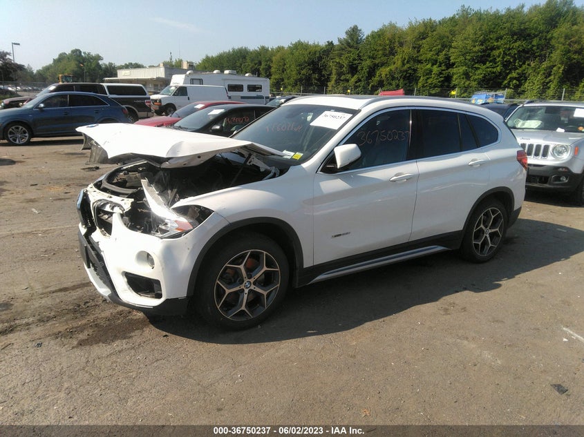 VIN WBXHT3C38J5F92355 2018 BMW X1 XDRIVE28I