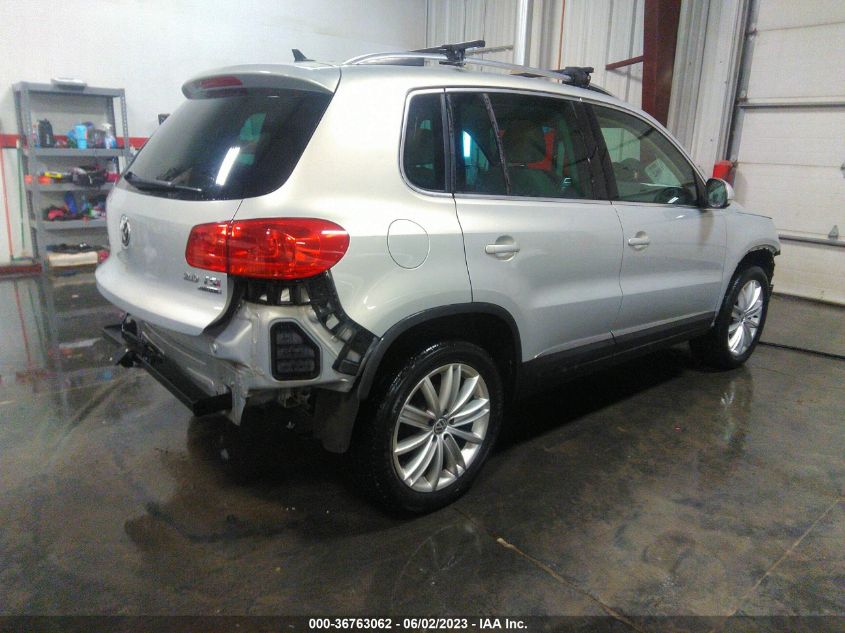 2013 VOLKSWAGEN TIGUAN SE W/SUNROOF & NAV - WVGBV7AX9DW556417