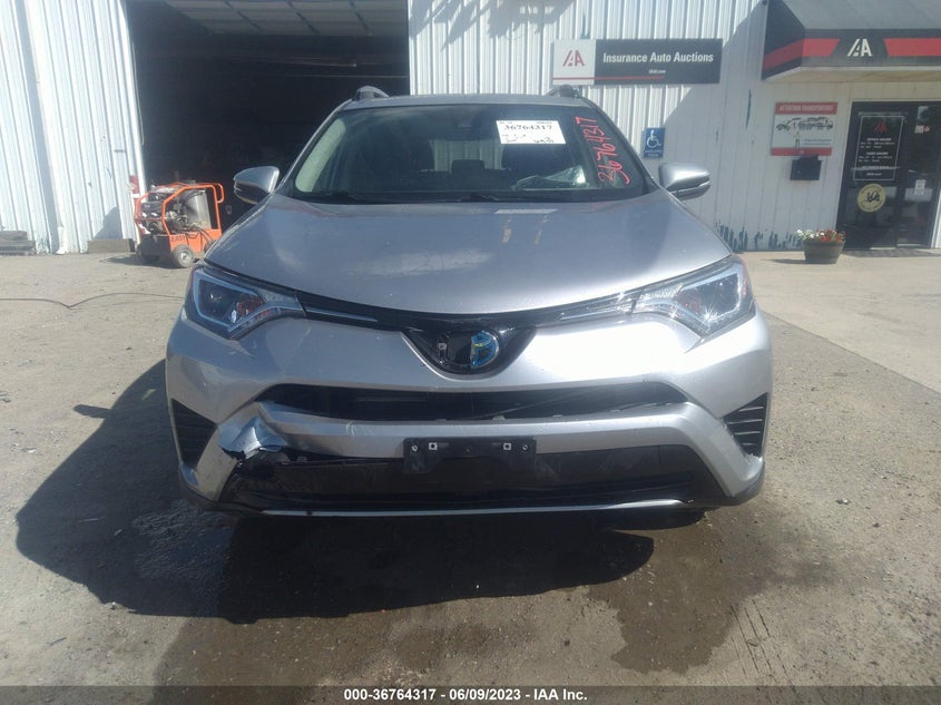 VIN JTMRJREV4JD227909 2018 TOYOTA RAV4 HYBRID LE