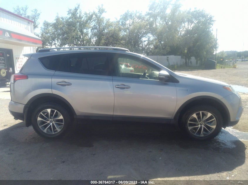 VIN JTMRJREV4JD227909 2018 TOYOTA RAV4 HYBRID LE