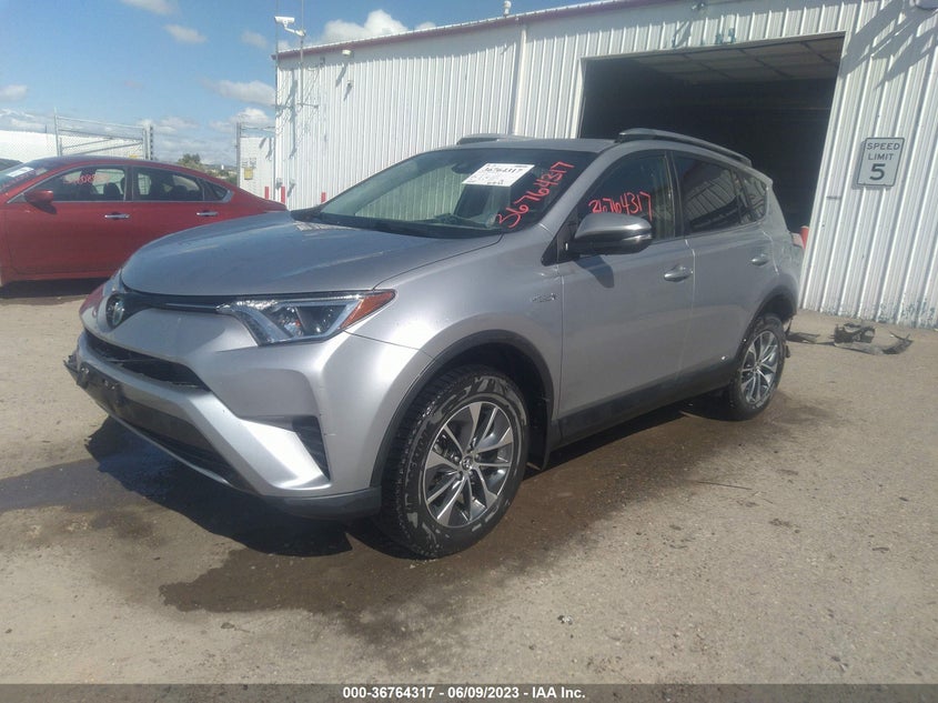 VIN JTMRJREV4JD227909 2018 TOYOTA RAV4 HYBRID LE
