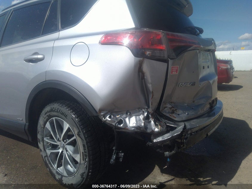 VIN JTMRJREV4JD227909 2018 TOYOTA RAV4 HYBRID LE