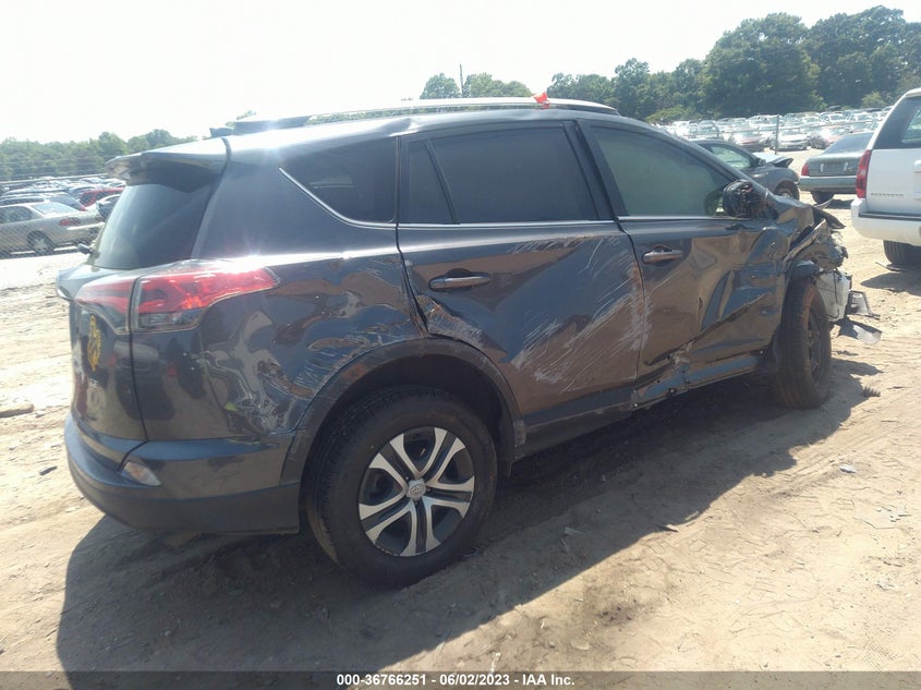 VIN JTMZFREV3JJ751703 2018 TOYOTA RAV4 LE
