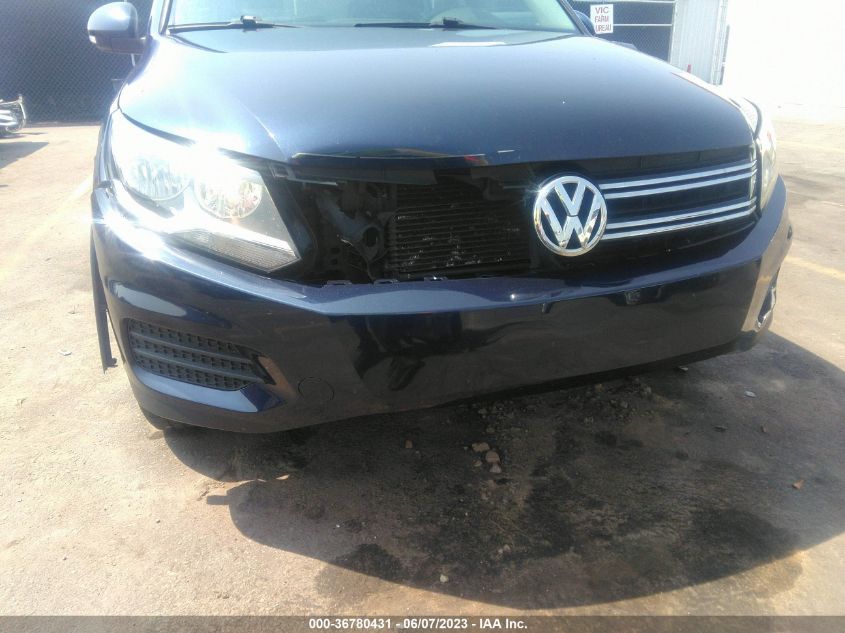 2014 VOLKSWAGEN TIGUAN S - WVGAV3AX5EW602461